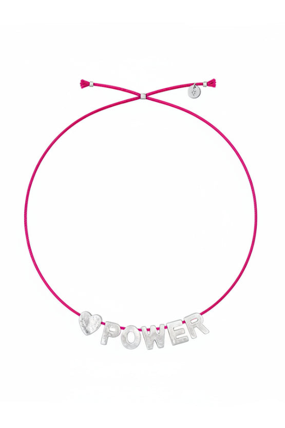An orange cord choker necklace featuring a silver-tone 'POWER' letter charm with a small heart charm, displayed on a clean white background.